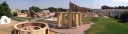 A panorama of Jantar Mantar.  View the full-sized image to get a taste
of diversity of angular and curved astronomical devices.  Many of the
objects pictured therein are photographed up close in later pictures;
this panorama is intended to (and does) give the sense of the place.
